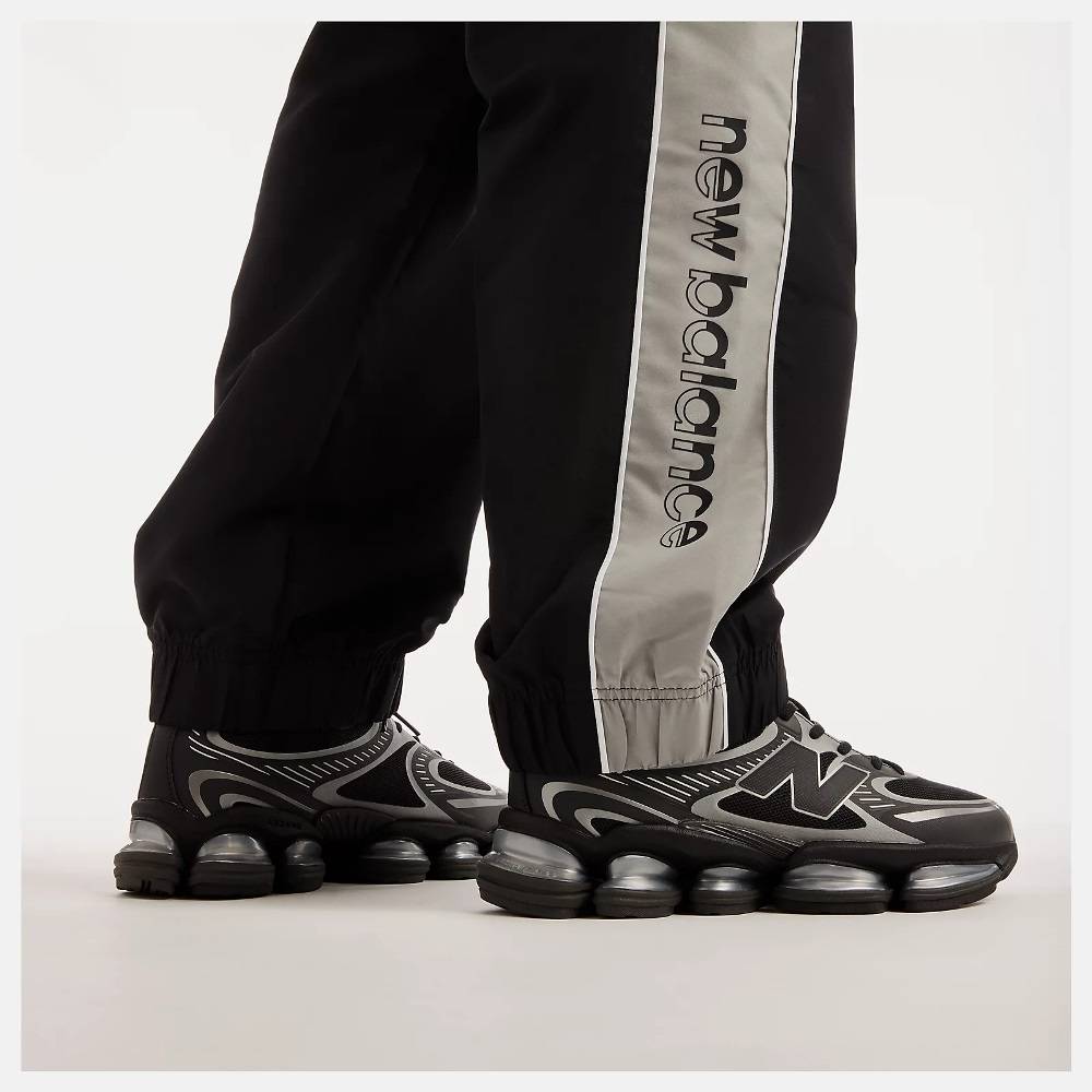 NEW BALANCE TRACKSIDE WOVEN PANT