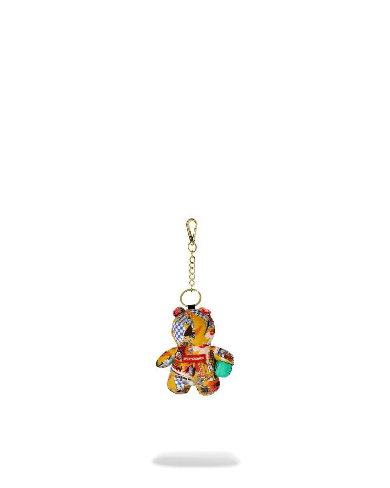 SPRAYGROUND MAGAZINE COLLAGE BEAR KEYCHAIN