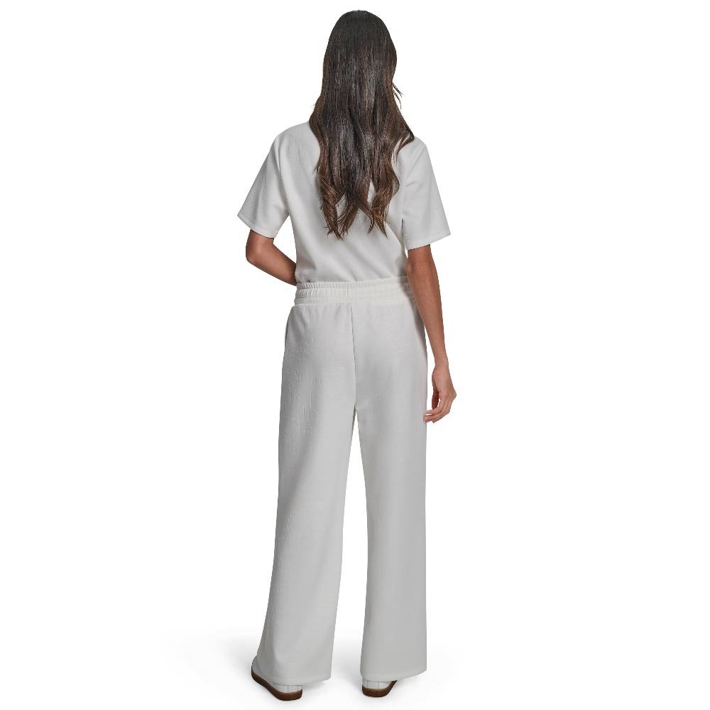 DKNY DEBOSSED WIDE LEG SCUBA SWEATPANTS