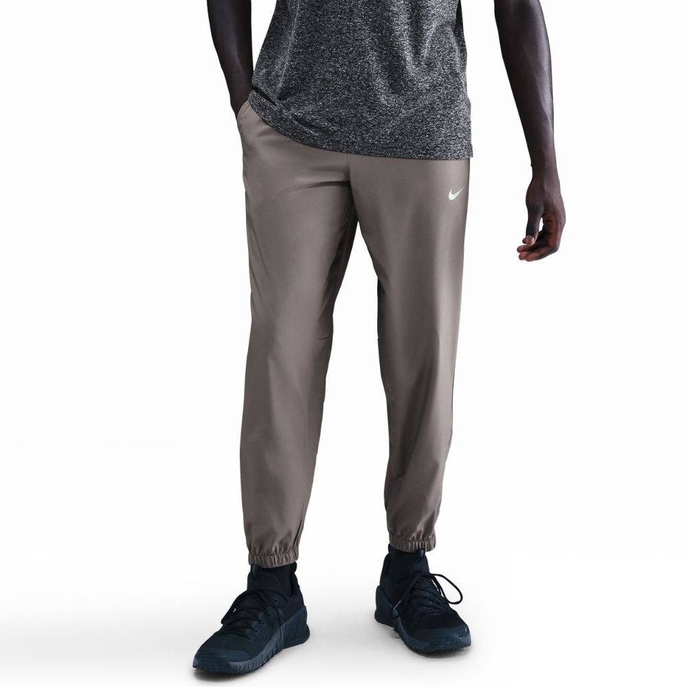 NIKE DRI-FIT TAPERED VERSALITE TROUSERS