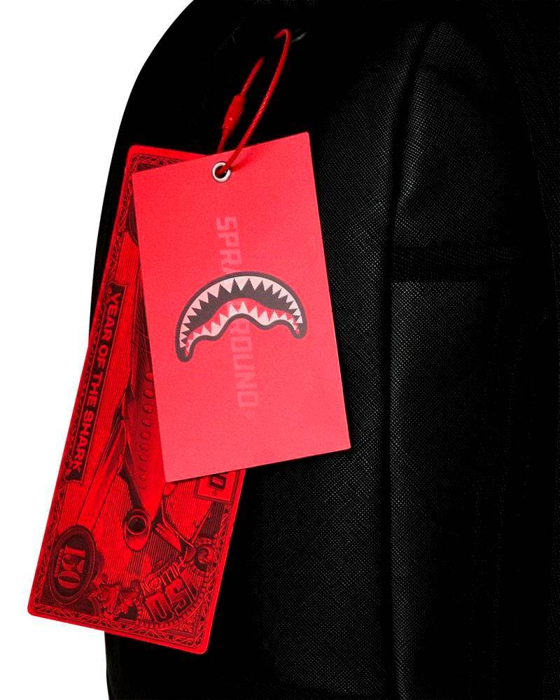 SPRAYGROUND BLACKED OUT EMBOSSED GOLD TOOTH DLXSV BACKPACK